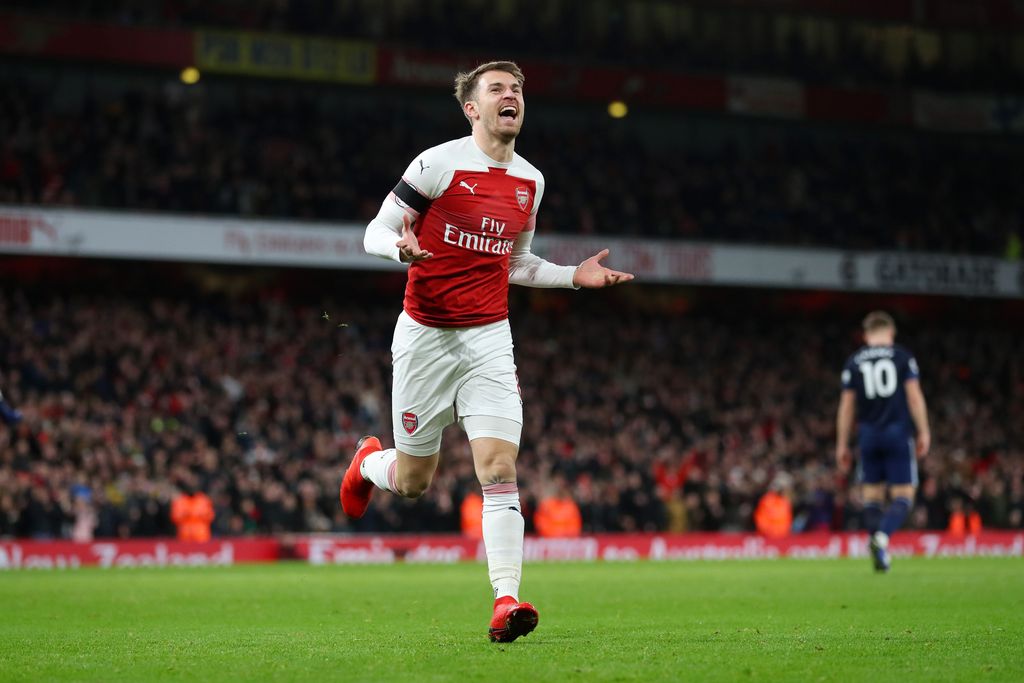 LONDON, ENGLAND - JANUARY 01:  Aaron Ramsey of Arsenal celebrates after scoring his team's third goal during the Premier League match between Arsenal FC and Fulham FC at Emirates Stadium on January 1, 2019 in London, United Kingdom.  (Photo by Catherine Ivill/Getty Images)