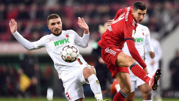 Munchen menang 3-2 atas Augsburg di Bundesliga.