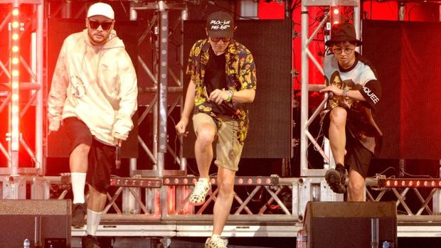 INDIO, CA - APRIL 17: (L-R) Mithra Jin, DJ Tukutz, and Tablo of Epik High perform onstage during day 3 of the 2016 Coachella Valley Music And Arts Festival Weekend 1 at the Empire Polo Club on April 17, 2016 in Indio, California.   Michael Tullberg/Getty Images for Coachella/AFP