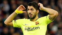 Tak bikin gol di kandang Lyon, Luis Suarez melanjutkan puasa golnya di laga tandang Liga Champions. Striker asal Uruguay itu sudah tak mencetak gol dalam 16 laga tandangnya di Liga Champions. Foto: Jean-Paul Pelissier/REUTERS