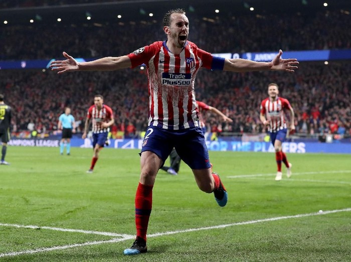 MADRID, SPAIN - FEBRUARY 20:  Diego Godin of Atletico Madrid celebrates after scoring his team's second goal during the UEFA Champions League Round of 16 First Leg match between Club Atletico de Madrid and Juventus at Estadio Wanda Metropolitano on February 20, 2019 in Madrid, Spain.  (Photo by Angel Martinez/Getty Images)