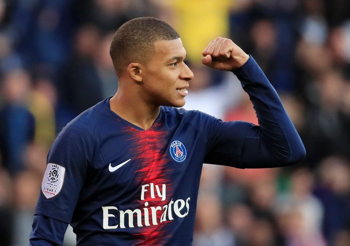 Soccer Football - Ligue 1 - Paris St Germain v Nimes Olympique - Parc des Princes, Paris, France - February 23, 2019  Paris St Germains Kylian Mbappe celebrates a goal before it is disallowed due to handball after a referral to VAR  REUTERS/Gonzalo Fuentes