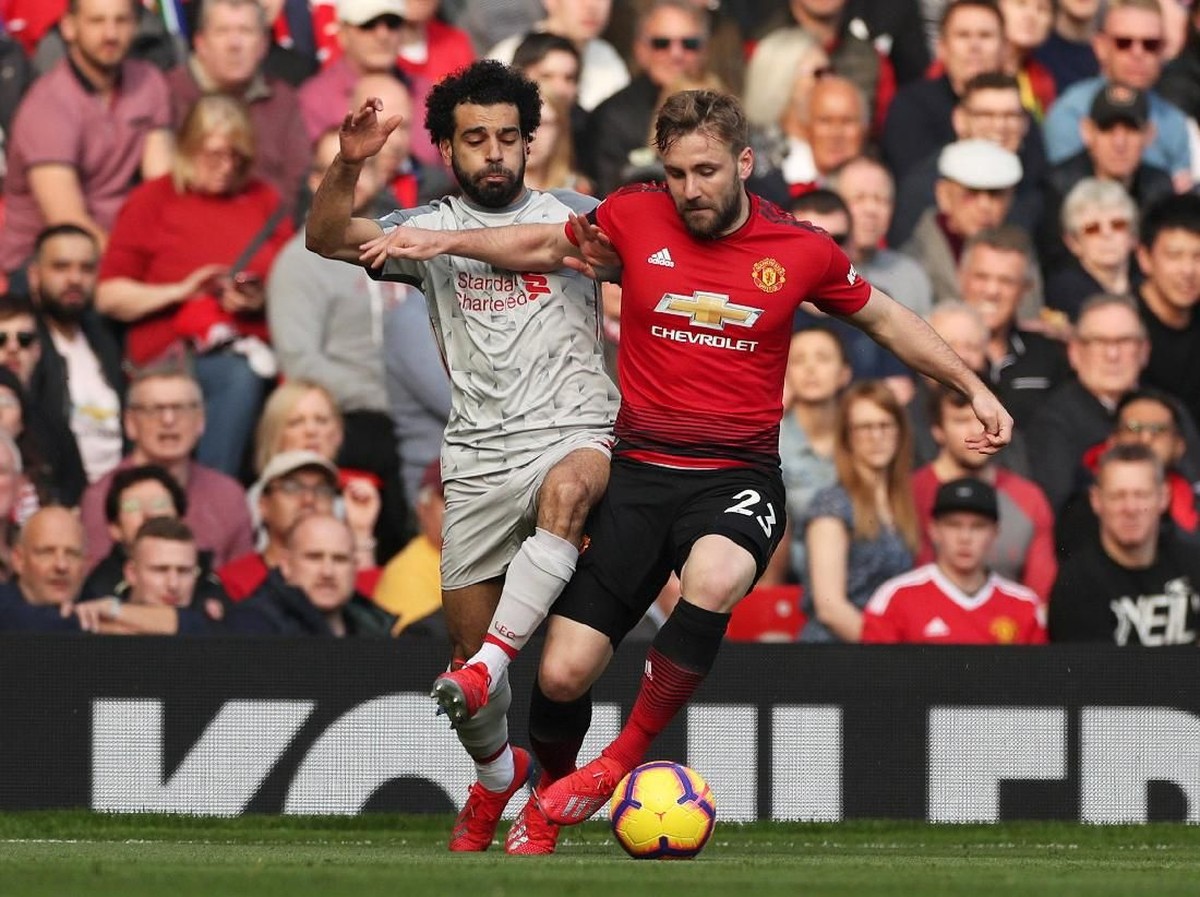 Aksi perebutan bola  di laga Manchester United vs Liverpool. (Foto: Lee Smith/Actions Images via Reuters)