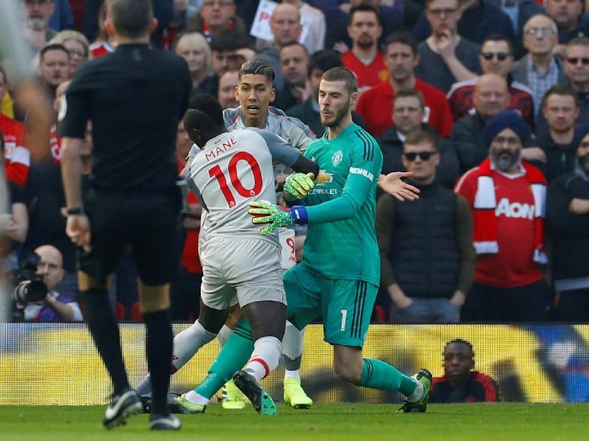 David De Gea pada laga Manchester United vs Liverpool. (Foto: Phil Noble/Reuters)