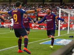 Bagi Messi, itu adalah hat-trick yang ke-50 di sepanjang kariernya di level klub dan timnas. Dengan tiga gol di laga tadi malam, Messi makin menegaskan gawang Sevilla sebagai favoritnya. Foto: Marcelo del Pozo/Reuters