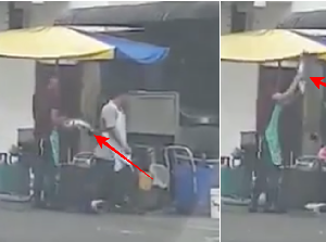 Duh, Pekerja Ini Sengaja Banting Ikan Hidup ke Jalanan Sebelum Dimasak