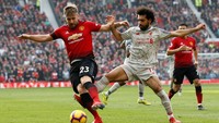 Duel Manchester United vs Liverpool berakhir tanpa pemenang. Bertanding di kandang The Red Devils, nyatanya tak membuat MU mampu merebut poin dari Liverpool. Phil Noble/Reuters.