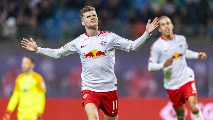 Leipzig´s forward Timo Werner celebrates scoring during the German first division Bundesliga football match between RB Leipzig and Werder Bremen in Leipzig, eastern Germany on December 22, 2018. (Photo by ROBERT MICHAEL / AFP) / RESTRICTIONS: DFL REGULATIONS PROHIBIT ANY USE OF PHOTOGRAPHS AS IMAGE SEQUENCES AND/OR QUASI-VIDEO