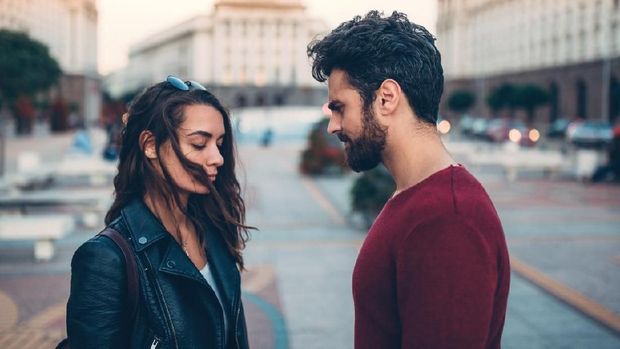 Man and woman arguing at the street