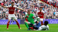 Tottenham masih di peringkat ketiga dengan mengumpulkan 61 poin, unggul empat poin dari Arsenal di bawahnya. Reuters/Andrew Couldridge.