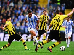 Leg pertama antara Malaga vs Dortmund di leg pertama perempatfinal Liga 2012/2013 berakhir tanpa gol. Pada leg kedua, laga berjalan dramatis setelah Dortmund menang dengan skor 3-2 lewat dua gol di injury time. (Foto: David Ramos/Getty Images)