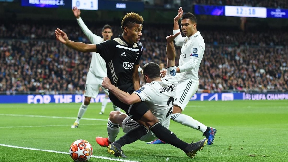 Real Madrid babak belur di tangan Ajax Amsterdam. (Foto: Denis Doyle/Getty Images)