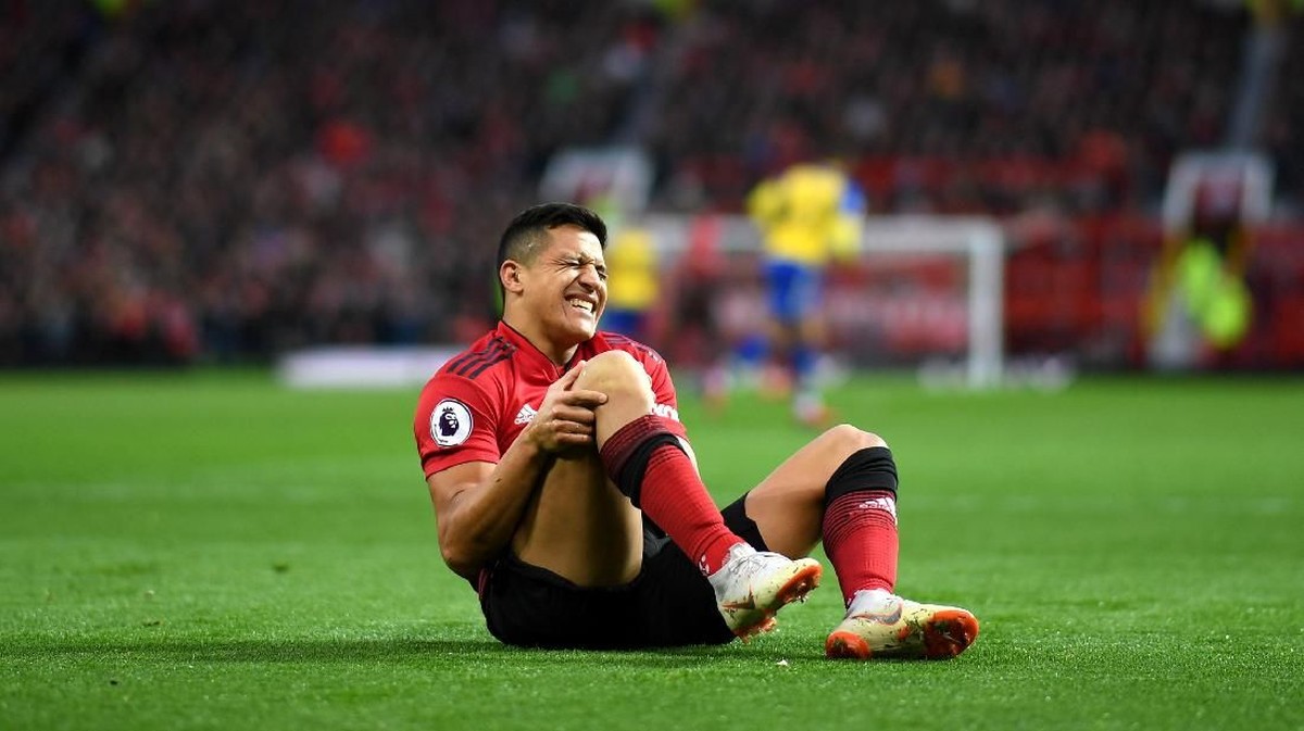 Ole Gunnar Solskjaer menyebut Alexis Sanchez akan absen sampai enam pekan akibat cedera lutut (Foto: Shaun Botterill/Getty Images)