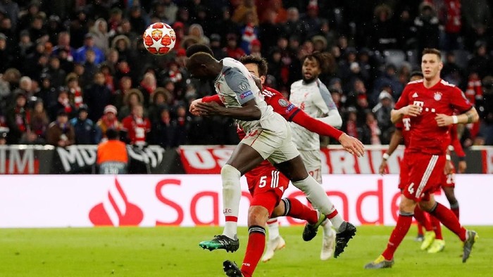 Soccer Football - Champions League - Round of 16 Second Leg - Bayern Munich v Liverpool - Allianz Arena, Munich, Germany - March 13, 2019  Liverpools Sadio Mane scores their third goal   Action Images via Reuters/Andrew Boyers