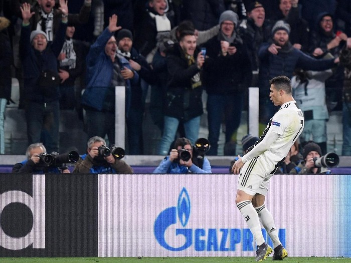 Soccer Football - Champions League - Round of 16 Second Leg - Juventus v Atletico Madrid - Allianz Stadium, Turin, Italy - March 12, 2019  Juventus Cristiano Ronaldo celebrates after the match  REUTERS/Alberto Lingria