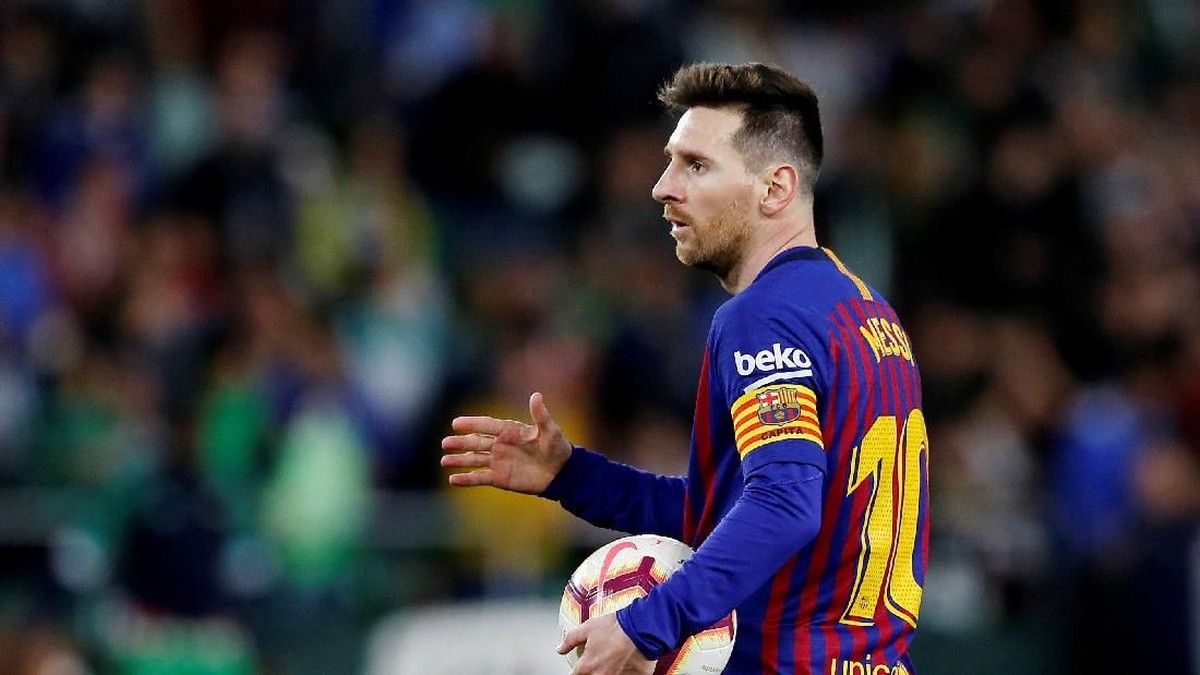 Lionel Messi bikin hat-trick ke gawang Real Betis (Marcelo del Pozo/REUTERS)