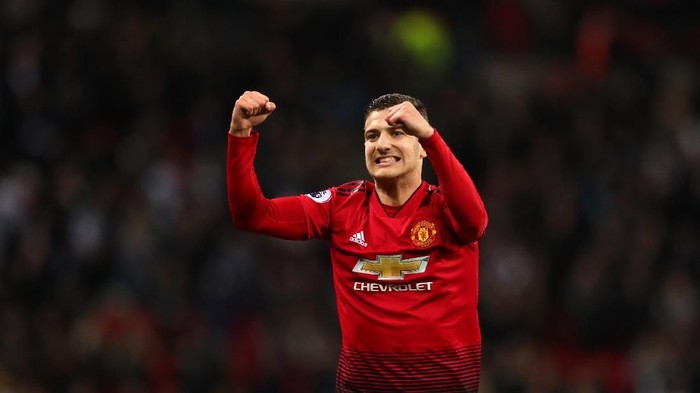 LONDON, ENGLAND - JANUARY 13: Diogo Dalot of Manchester United celebrates after the Premier League match between Tottenham Hotspur and Manchester United at Wembley Stadium on January 13, 2019 in London, United Kingdom. (Photo by Catherine Ivill/Getty Images)