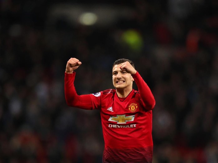 LONDON, ENGLAND - JANUARY 13: Diogo Dalot of Manchester United celebrates after the Premier League match between Tottenham Hotspur and Manchester United at Wembley Stadium on January 13, 2019 in London, United Kingdom. (Photo by Catherine Ivill/Getty Images)