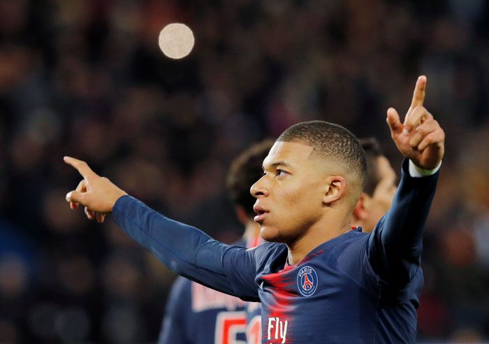 Kylian Mbappe Soccer Football - Ligue 1 - Paris St Germain v Olympique de Marseille - Parc des Princes, Paris, France - March 17, 2019 Paris St Germains Kylian Mbappe celebrates scoring their first goal REUTERS/Philippe Wojazer
