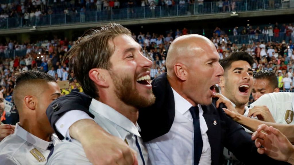MALAGA, SPAIN - MAY 21:  Zinedine Zidane, Manager of Real Madrid celebrates with Sergio Ramos of Real Madrid after being crowned champions following the La Liga match between Malaga and Real Madrid at La Rosaleda Stadium on May 21, 2017 in Malaga, Spain.  (Photo by Gonzalo Arroyo Moreno/Real Madrid via Getty Images)