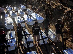 Pemakaman Massal Korban Banjir Bandang Sentani Pemakaman Massal Korban Banjir Bandang Sentani