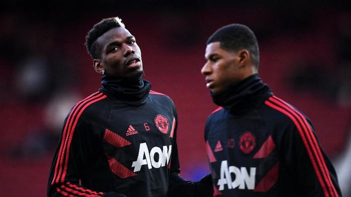 Paul Pogba dan Marcus Rashford penampilannya menanjak sejak Ole Gunnar Solskjaer datang (Laurence Griffiths/Getty Images)