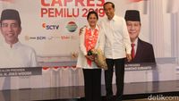 Deretan Gaya Iriana Pakai Syal 01 Saat Dampingi Jokowi di Debat Capres