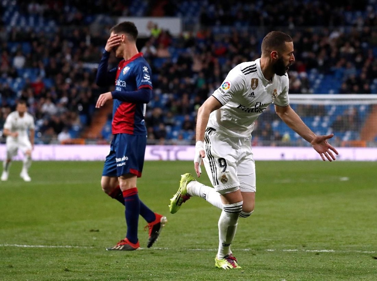 Real Madrid menang tipis atas Huesca 3-2. (Foto: Juan Medina / Reuters)
