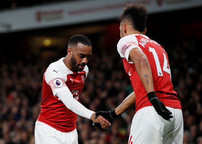 Soccer Football - Premier League - Arsenal v Newcastle United - Emirates Stadium, London, Britain - April 1, 2019  Arsenal's Alexandre Lacazette celebrates scoring their second goal with Pierre-Emerick Aubameyang   REUTERS/David Klein  EDITORIAL USE ONLY. No use with unauthorized audio, video, data, fixture lists, club/league logos or 