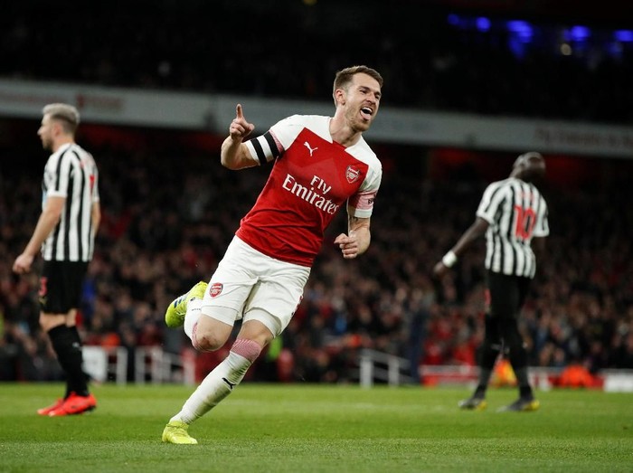 Soccer Football - Premier League - Arsenal v Newcastle United - Emirates Stadium, London, Britain - April 1, 2019  Arsenal's Aaron Ramsey celebrates scoring their first goal  Action Images via Reuters/John Sibley  EDITORIAL USE ONLY. No use with unauthorized audio, video, data, fixture lists, club/league logos or 