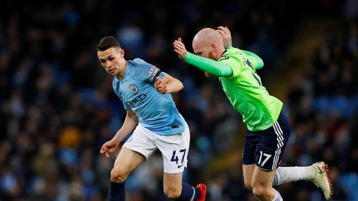 Phil Foden saat Man City menghadapi Cardiff City (Phil Noble/Reuters)