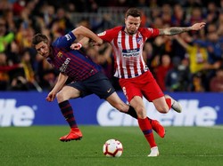 Barcelona mencoba menguasai pertandingan dan mengontrol tempo, tapi Atletico menekan balik dengan agresif. Reuters/Albert Gea.