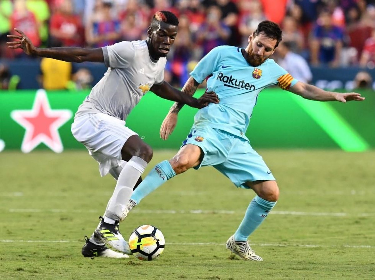 Manchester United vs Barcelona: Performa Paul Pogba dan Lionel Messi akan menentukan penampilan masing-masing tim. Foto: Nicholas Kamm / AFP