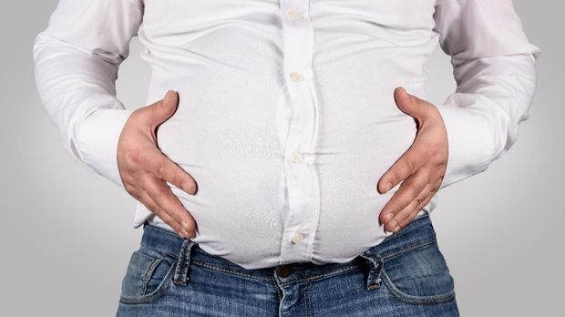 Over weight - Fat man shows his belly