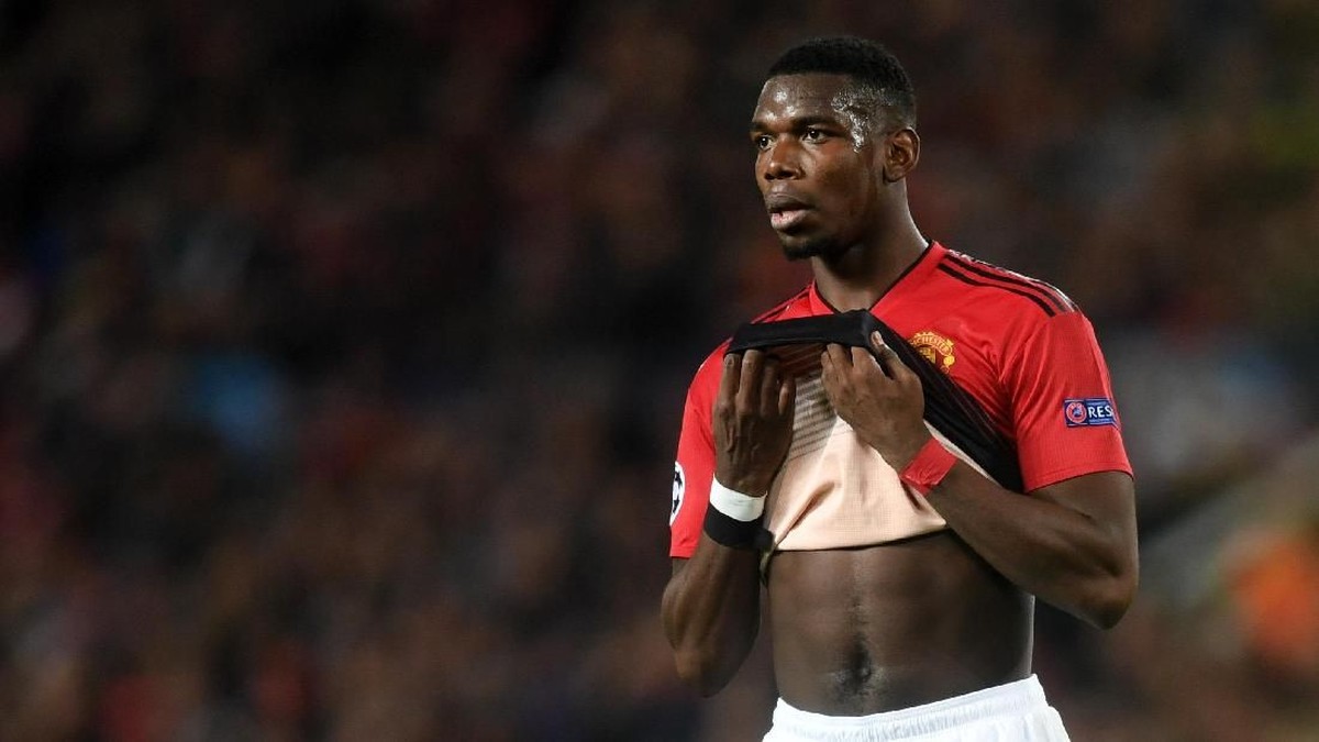 Paul Pogba dinilai tetap fokus bersama Manchester United kendati diminati Real Madrid. (Foto: Michael Regan / Getty Images)