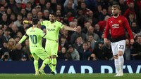 Barcelona mengalahkan Manchester United 1-0 dalam leg pertama perempatfinal Liga Champions di Old Trafford. Reuters/Lee Smith.