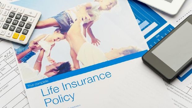 Close up of a Life insurance policy with family image. The included image can be found in my portfolio. Image  #37803180