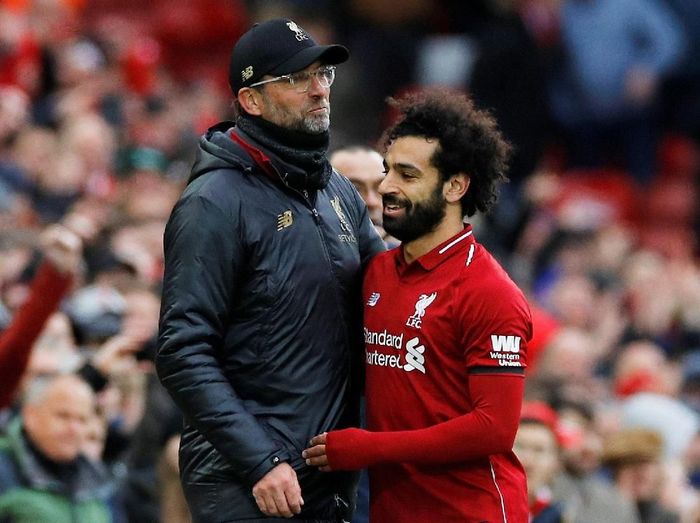 Mohamed Salah yakin kalau empat kemenangan lagi akan mengantar Liverpool memenangi Liga Inggris (REUTERS/Phil Noble)