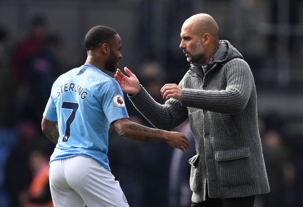 Soccer Football - Premier League - Crystal Palace v Manchester City - Selhurst Park, London, Britain - April 14, 2019  Manchester City's Raheem Sterling celebrates after the match with manager Pep Guardiola      Action Images via Reuters/Tony O'Brien  EDITORIAL USE ONLY. No use with unauthorized audio, video, data, fixture lists, club/league logos or 