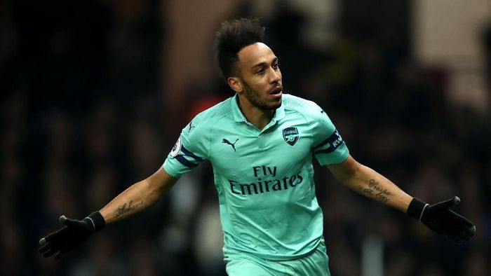 Penyerang Arsenal Pierre-Emerick Aubameyang merayakan gol ke gawang Watford. (Foto: Marc Atkins/Getty Images) Penyerang Arsenal Pierre-Emerick Aubameyang merayakan gol ke gawang Watford. (Foto: Marc Atkins/Getty Images)