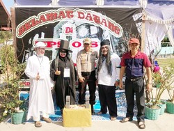 TPS Unik di Penjuru RI, dari Busana Horor hingga Berbaju Petani
