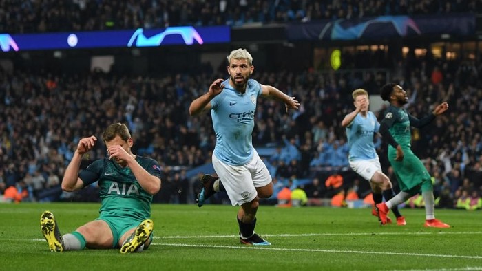 MANCHESTER, ENGLAND - APRIL 17:  Sergio Aguero of Manchester City celebrates after scoring his team's fourth goal as Jan Vertonghen of Tottenham Hotspur reacts during the UEFA Champions League Quarter Final second leg match between Manchester City and Tottenham Hotspur at at Etihad Stadium on April 17, 2019 in Manchester, England. (Photo by Shaun Botterill/Getty Images)