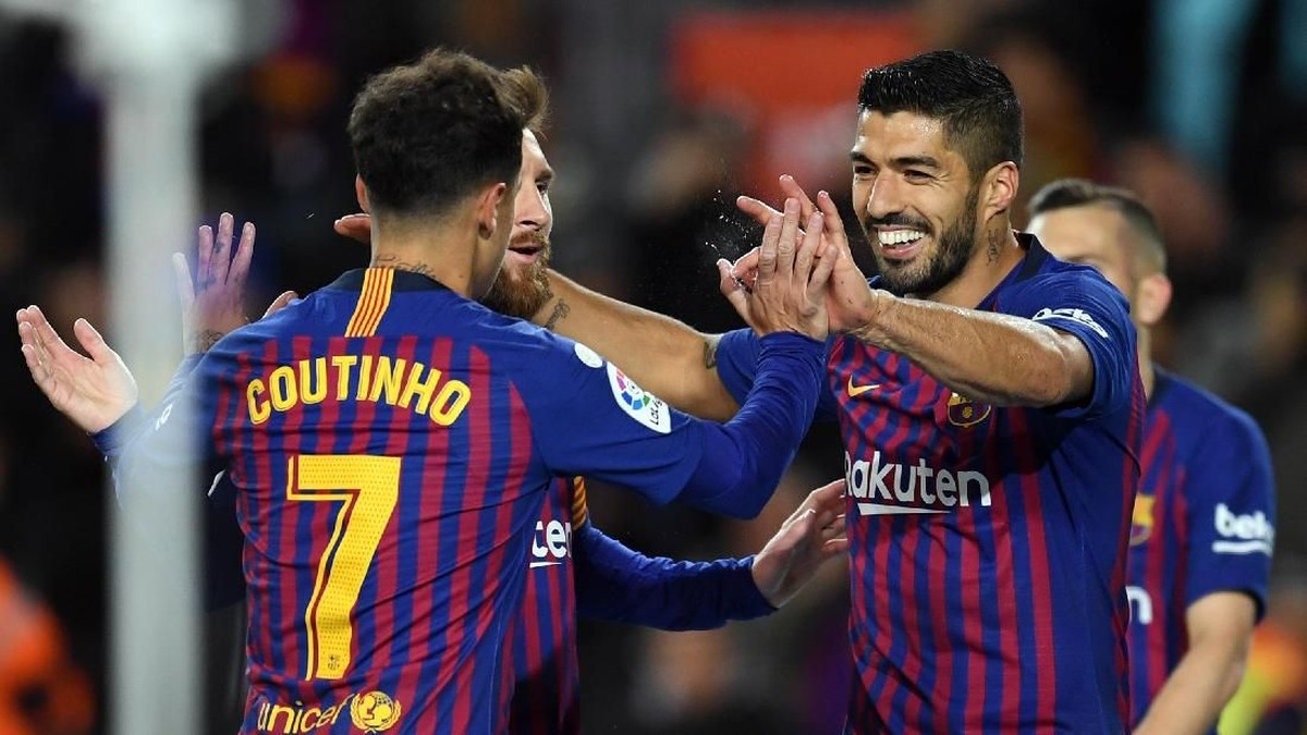 Dua eks pemain Liverpool, Luis Suarez dan Philippe Coutinho, dengan seragam Barcelona. (Foto: David Ramos/Getty Images)