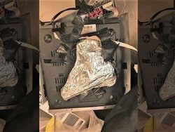 Ketahuan! Penumpang Pesawat Sembunyikan Pistol di Dalam DVD