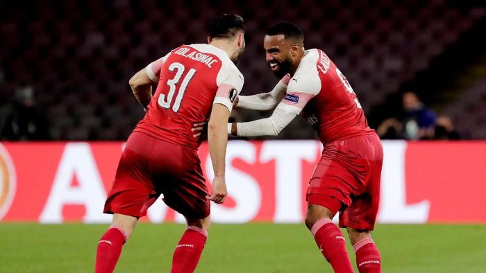 Pemain Arsenal, Alexandre Lacazette, merayakan gol ke gawang Napoli. (Foto: Ciro De Luca/Reuters)