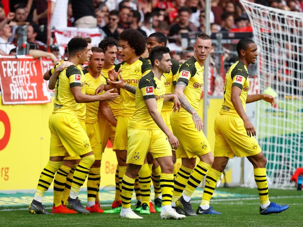 Borussia Dortmund merayakan kemenangan atas Freiburg. (Foto: Kai Pfaffenbach/Reuters)