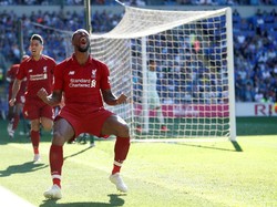 Georginio Wijnaldum merayakan gol yang dicetaknya. Reuters/Carl Recine.