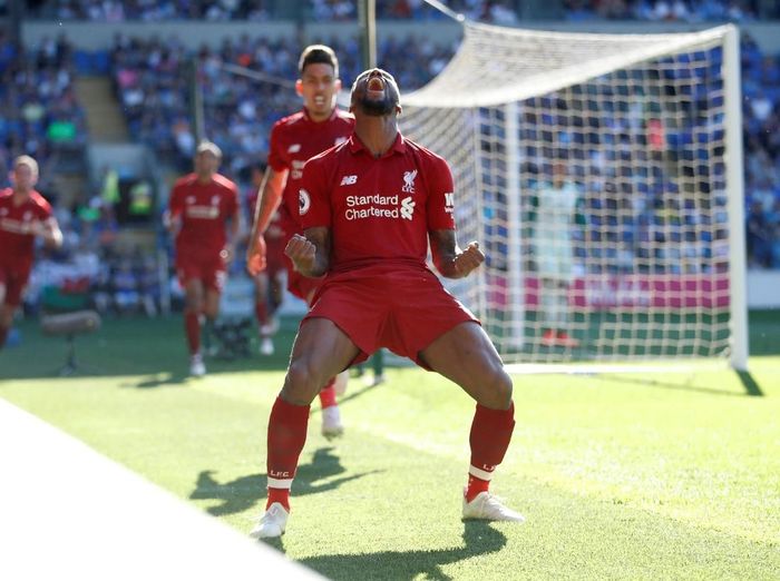Georginio Wijnaldum merayakan golnya untuk Liverpool ke gawang Cardiff City. (Foto: Carl Recine/Action Images via Reuters) Georginio Wijnaldum merayakan golnya untuk Liverpool ke gawang Cardiff City. (Foto: Carl Recine/Action Images via Reuters)