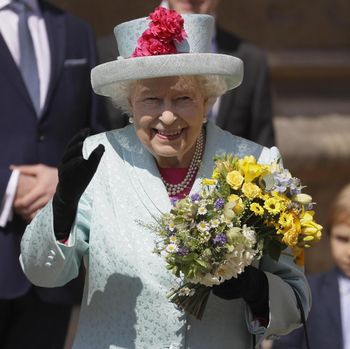Britain's Queen Elizabeth II waves to the public as she leaves after attending the Easter Mattins Service at St. George's Chapel, at Windsor Castle in England Sunday, April 21, 2019. (AP Photo/Kirsty Wigglesworth, pool)