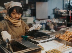 Mochi rice cake on bamboo sticks